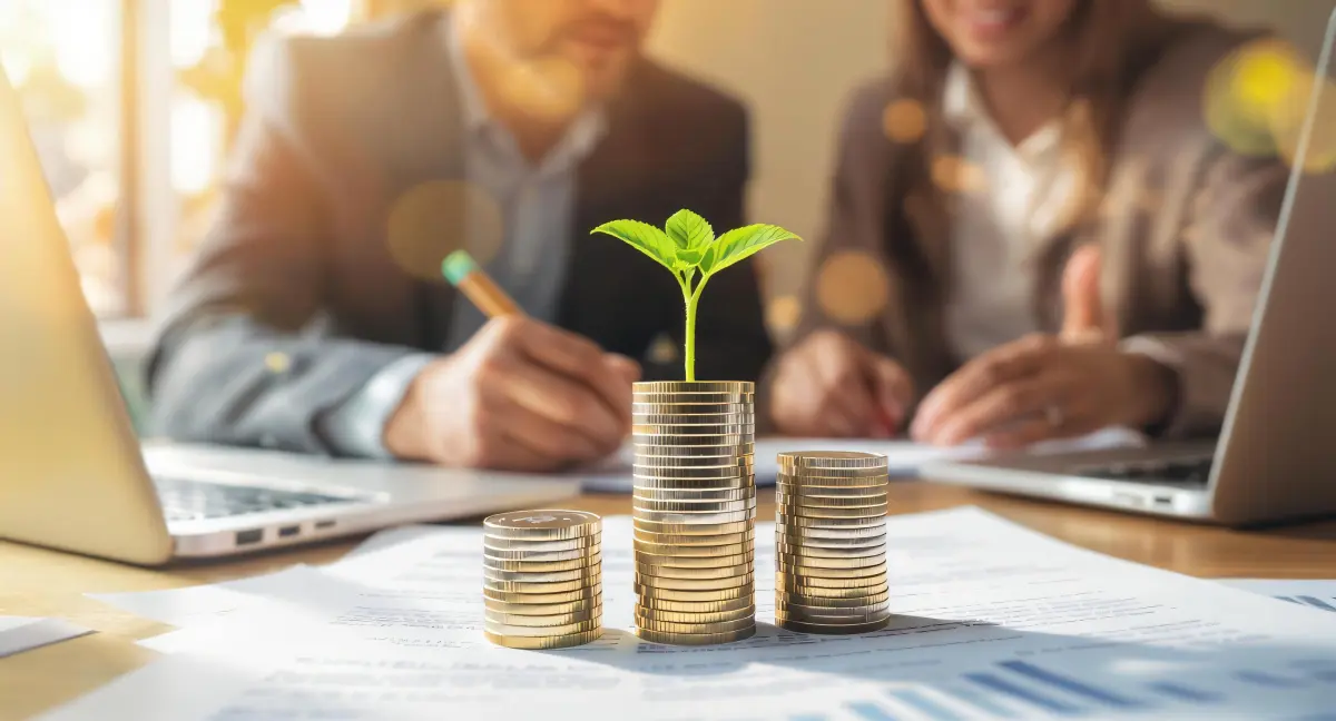 Business Growth Concept with Coins and Plant